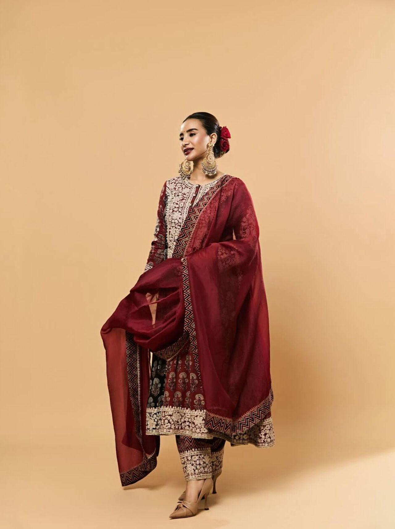 Always experimental, Patralekha turns red into a fashion statement with daring cuts and modern accents.